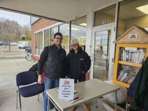 Austin Wiberg and Brittany Bennis volunteering at WeCAN's annual coat distribution event.